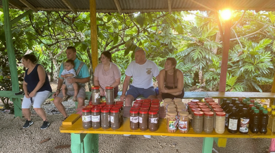 Visitors enjoying local products at Excursia Punta Cana tour site.